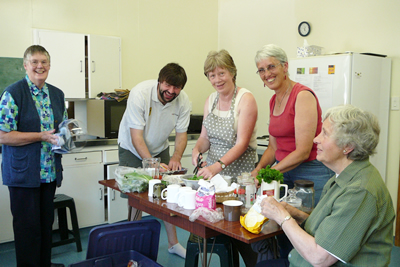 Some of the Community preparing a meal for a Retreat Group
